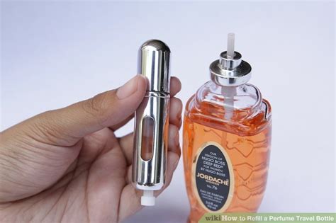 refilling a traveling perfume bottle.